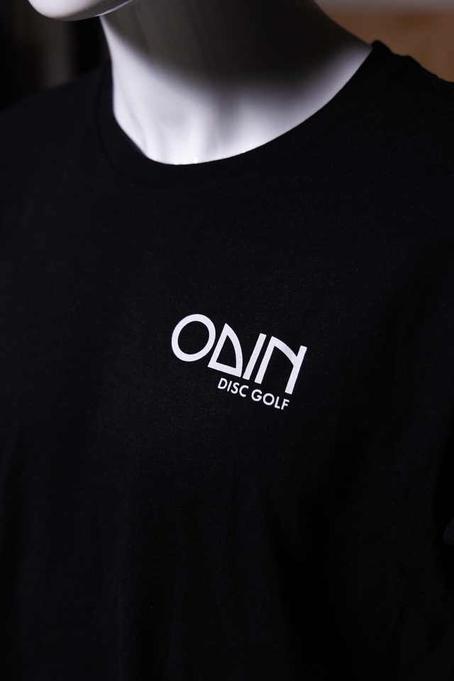 Black Men's disc golf t-shirt showcasing white Odin logo on chest  – Odin Disc Golf