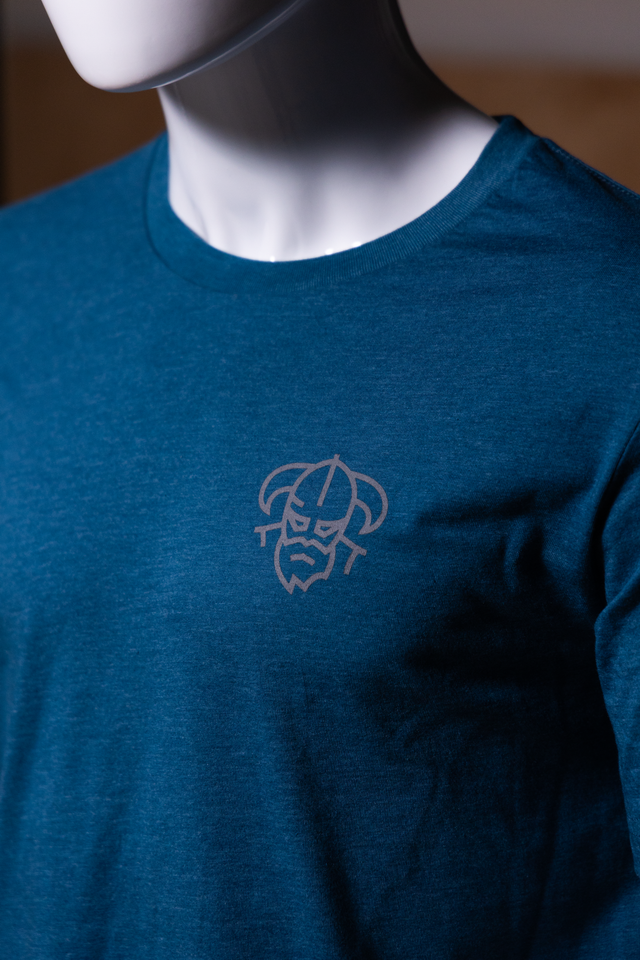 Blue Men's disc golf t-shirt showcasing grey Odin logo on chest  – Odin Disc Golf
